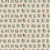 Close up of fabric with the alphabet letters arranged in order with flowers on them on a cream colored background