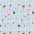 Close up of blue gingham fabric with trees, fruits, farm animals, houses, and flowers