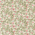 Close up of fabric with green leaves, vines, and red holly berries on a cream colored background