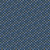 Close up of fabric with polka dots in yellow, light blue, dark blue, and green on a navy background