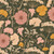 Close up of fabric with pink, beige, and yellow flowers on a dark green background