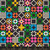 7inch by 7inch of fabric with a retro patchwork design in white, orange, red, mustard yellow, pink, green, and blue on a black background