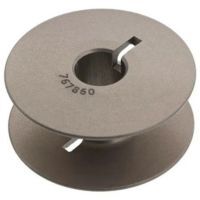 close up of the Janome jumbo metal bobbin