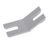 Closeup image of the button shank plate