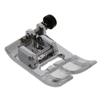 Also called the All-Purpose Foot, the Zig-Zag foot is used for most utility sewing, from straight stitch to zig-zag stitching.