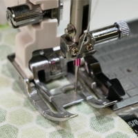Close-up of the AcuFeed Dual Feed Quilt Piecing Foot OD