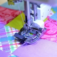 Close-up of the AcuFeed Dual Feed Ditch Quilting Foot SD