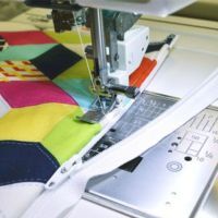 close up of the AcuFeed zipper foot in action