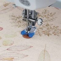 Close-up of the button sewing foot