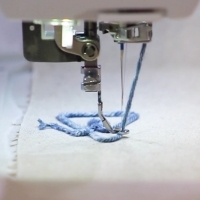 Close-up of the couching foot