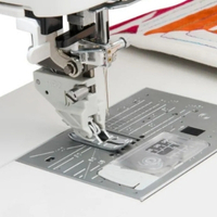 close-up of the professional grade AcuFeed dual feed foot in action