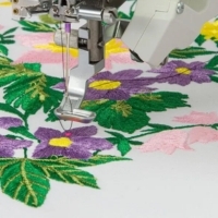 Close-up of the embroidery positioning marker foot PM