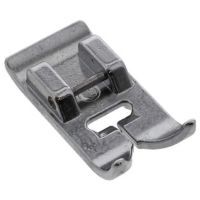 Also called the All-Purpose Foot, the Zig-Zag foot is used for most utility sewing, from straight stitch to zig-zag stitching.
