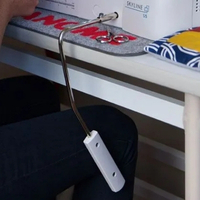 Image of knee lift in use positioned near knee.
