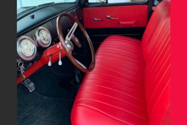 Custom red leather car seat covers showcasing the Juki TL-18QVP's heavy-duty power