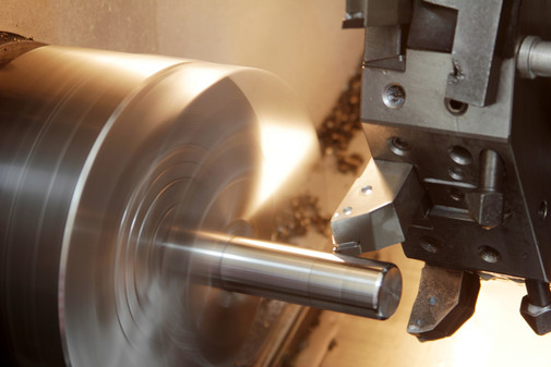 A stainless steel rod is milled in a cnc machine.