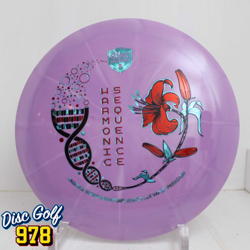 Discmania Paradigm Lux Vapor - Harmonic Sequence - Cadence Burge (Triple Stamp) 177.1g Purple A Discmania Paradigm Lux Vapor - Harmonic Sequence - Cadence Burge (Triple Stamp) 177.1g Purple A