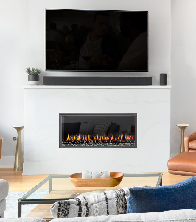 Montigo R320N Exemplar single-sided gas fireplace — manufacturer installation image; decorative media shown