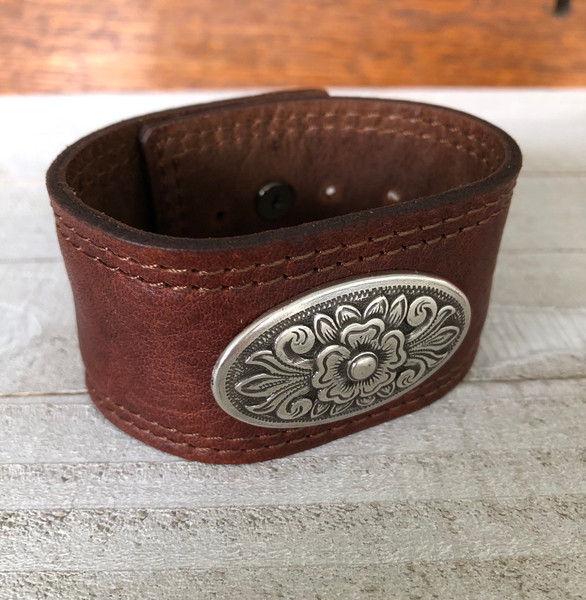 Brown leather cuff bracelet with medallion
