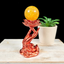Metallic Orange Hand with Lotus Sphere Stand