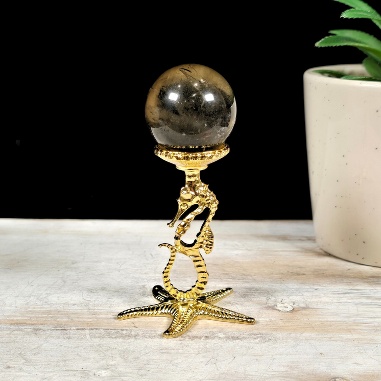 Seahorse Gold Metal Sphere Stand