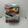 2026 Auto World Premium 1:64 1976 Cadillac Coupe de Ville Amberlite Firemist Poly Release 1 Version A 