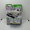 2026 Auto World 1:64 Premium 1976 Cadillac Coupe de Ville Phoenician Ivory Release 1 Version B 