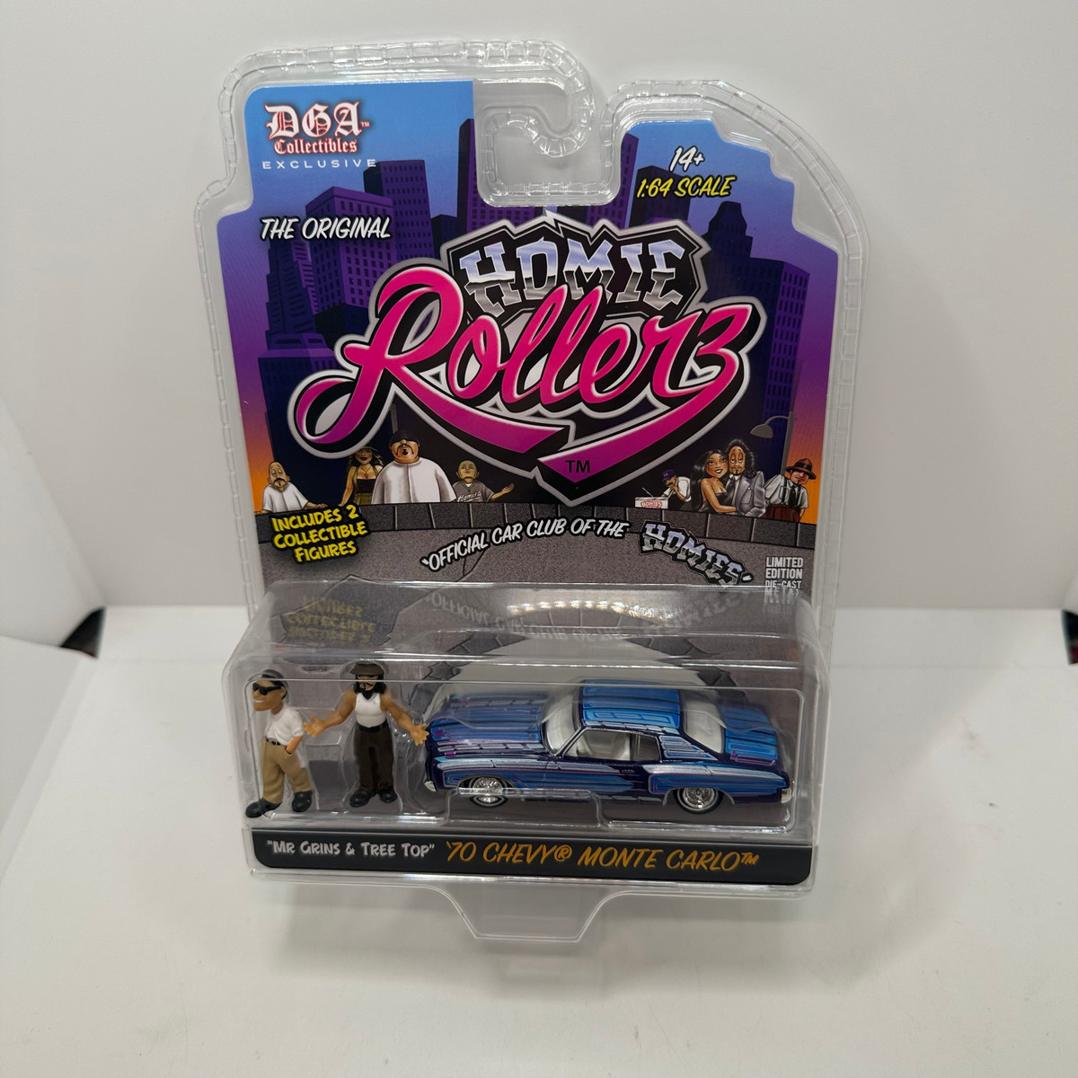 2025 Greenlight/DGA Exclusive Homie Rollerz 1970 Chevrolet Monte Carlo w/ Mr. Grins & Tree Top Series 1 