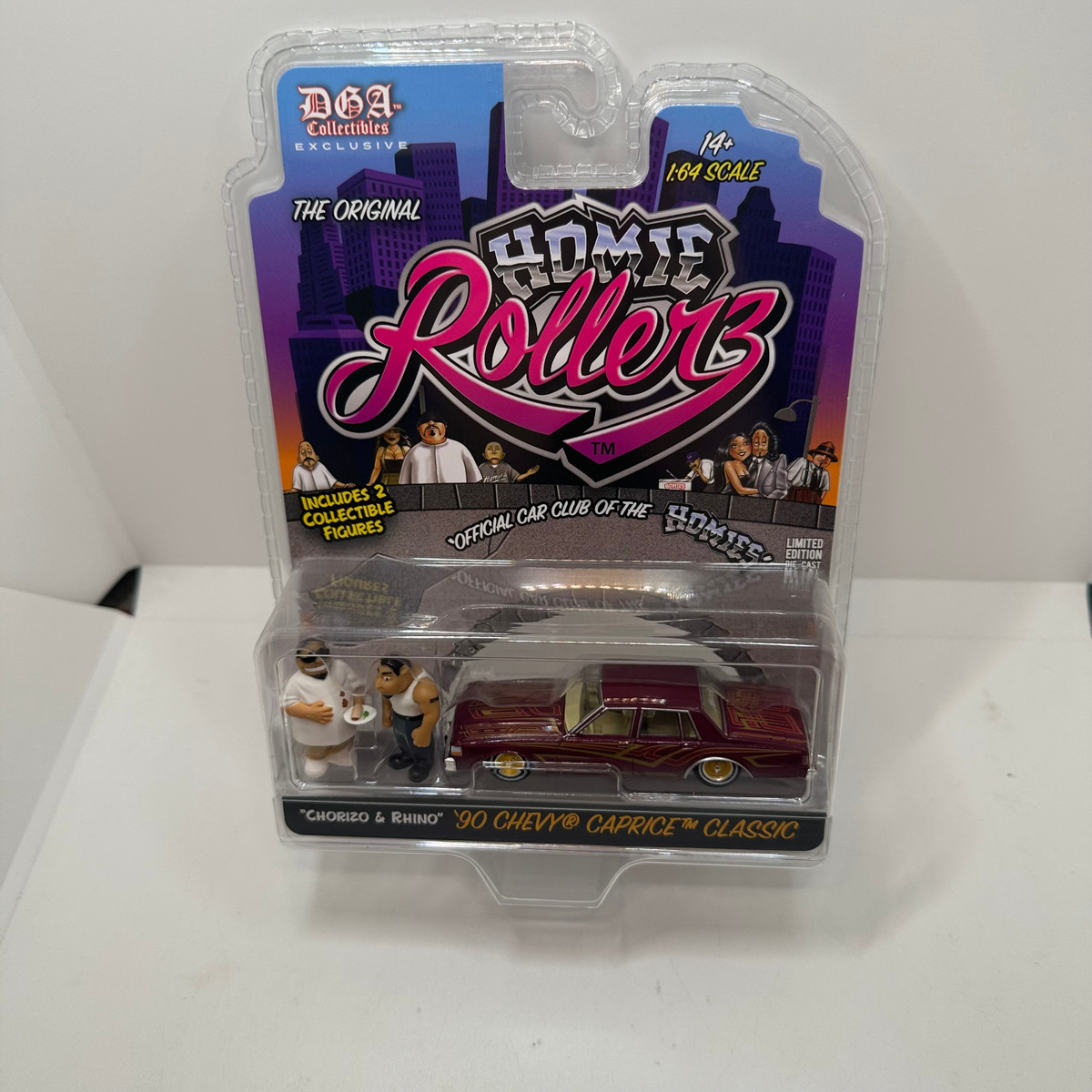 2025 Greenlight/DGA Exclusive Homie Rollerz 1990 Chevrolet Caprice Classic w/ Chorizo & Rhino Series 1 