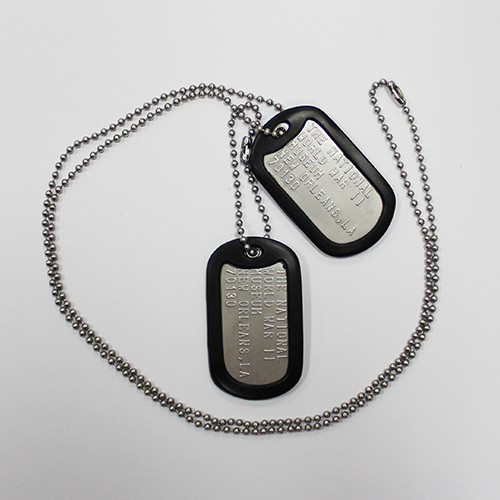 far away image of a double dog tag with silencer