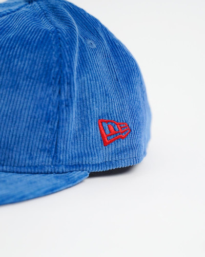 New Era Light Blue Golfer Cap with Retro Lion Mascot