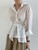 [LANMREM] Elegant Shirt For Women Lapel Long Sleeve Irregular Single Breasted Design Solid Color Female Shirts 2025 New 26A1626