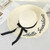 Handmade Weave Letter Sun Hats for Women Black Ribbon Lace Up Large Brim Straw Hat Outdoor Beach Hat Summer Caps