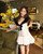 Elegant White Lace Dress With Black Velvet Trim Bow Detail Flirty Feminine Design Perfect For Special Occasions Evening  Wear