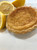 A bright and tangy Southern classic. Mr. Tod’s 4" Lemon Chess Pies combine zesty lemon flavor with a rich, custard-like filling in a golden, flaky crust. Each pie is individually packaged and baked to perfection—perfect for parties, gifts, or a personal treat.