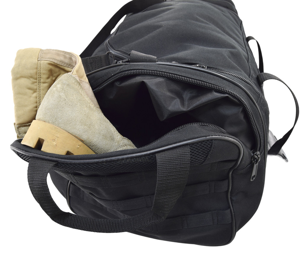 One large external end pocket can be used as a boot bag or dirty laundry compartment, shown with boots in the pocket.