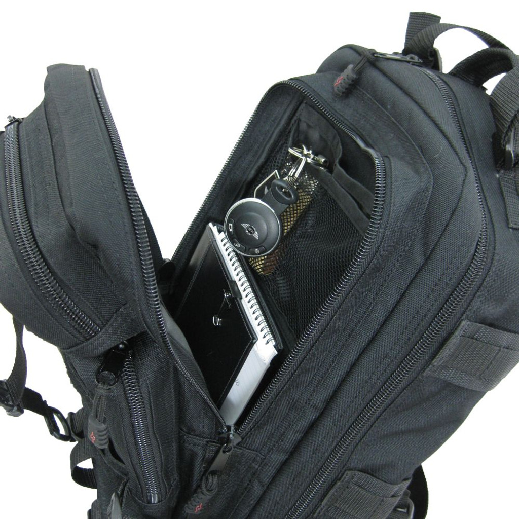 Presidio Tactical Assault Pack in black center compartment opened showing mesh slip-in pocket inside.