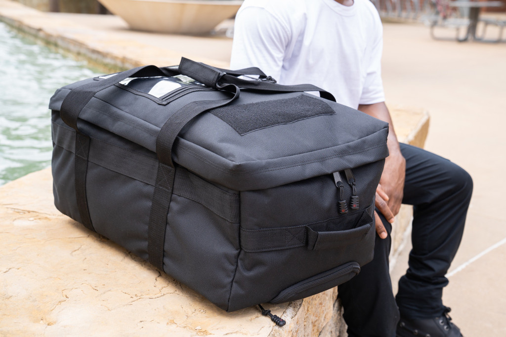 Mini Buffalo Rolling Duffel in Black footlocker profile.