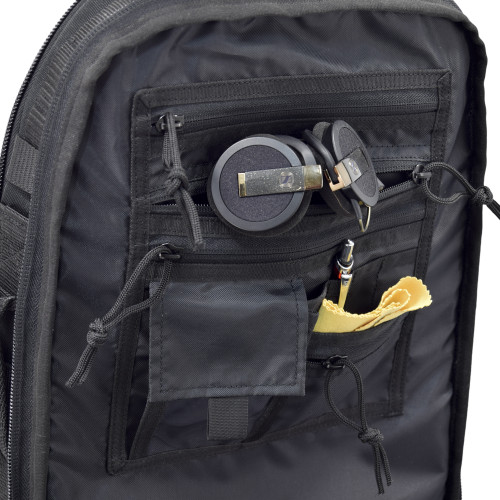 Organizer panel inside with multiple pockets for smaller items, shown in Brazos Concealed Carry Backpack in black.