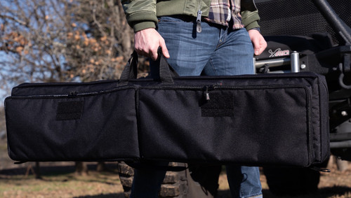 Black Single Rifle Case carried by top handle.