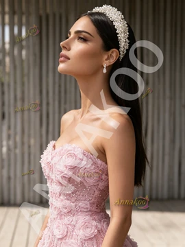 Close-up of rose embellishments on pink sequin formal gown