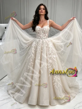 layered tulle skirt of spaghetti strap backless A-line bridal gown