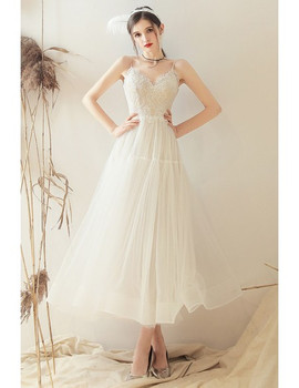 Shop 2020 Beach Open Back Retro Vintage Style Tea Length Spaghetti Straps Wedding Dress from ANNAKOO