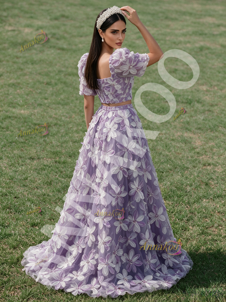 Purple two piece prom top with floral A-line skirt and natural waist