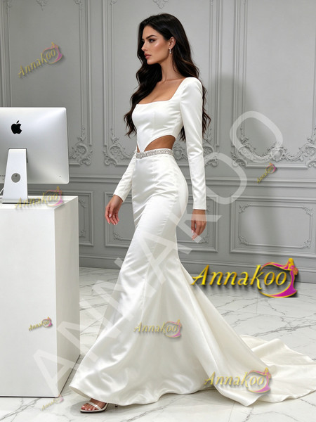 Full-length front view of long sleeve beaded satin mermaid wedding gown
