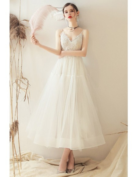 Shop 2020 Beach Open Back Retro Vintage Style Tea Length Spaghetti Straps Wedding Dress from ANNAKOO