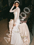 High Neck Sheath Wedding Dress With Crystal Beading And Long Sleeves