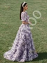 Purple two piece prom top with floral A-line skirt and natural waist