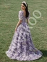 Purple two piece prom top with floral A-line skirt and natural waist