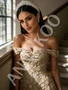 Floral beaded details on champagne prom dress